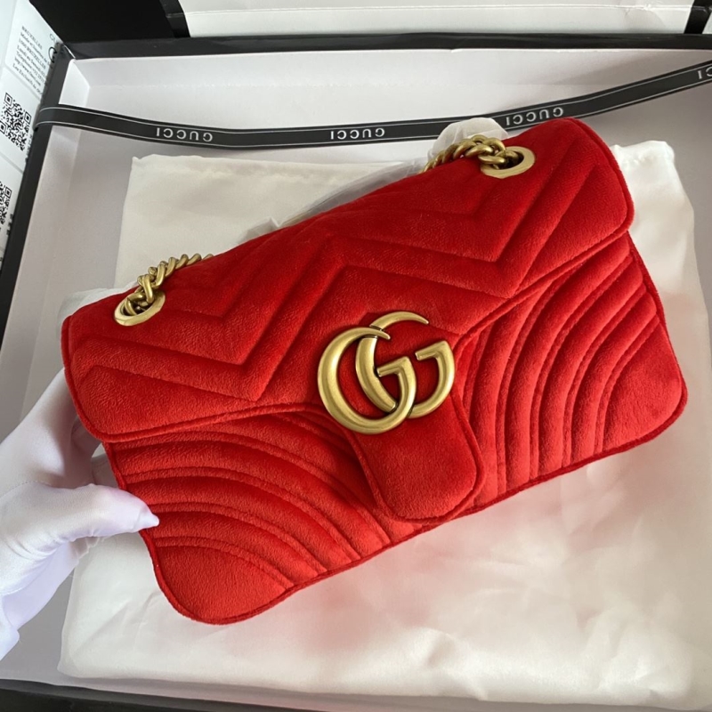 G*u*i clutch bags
